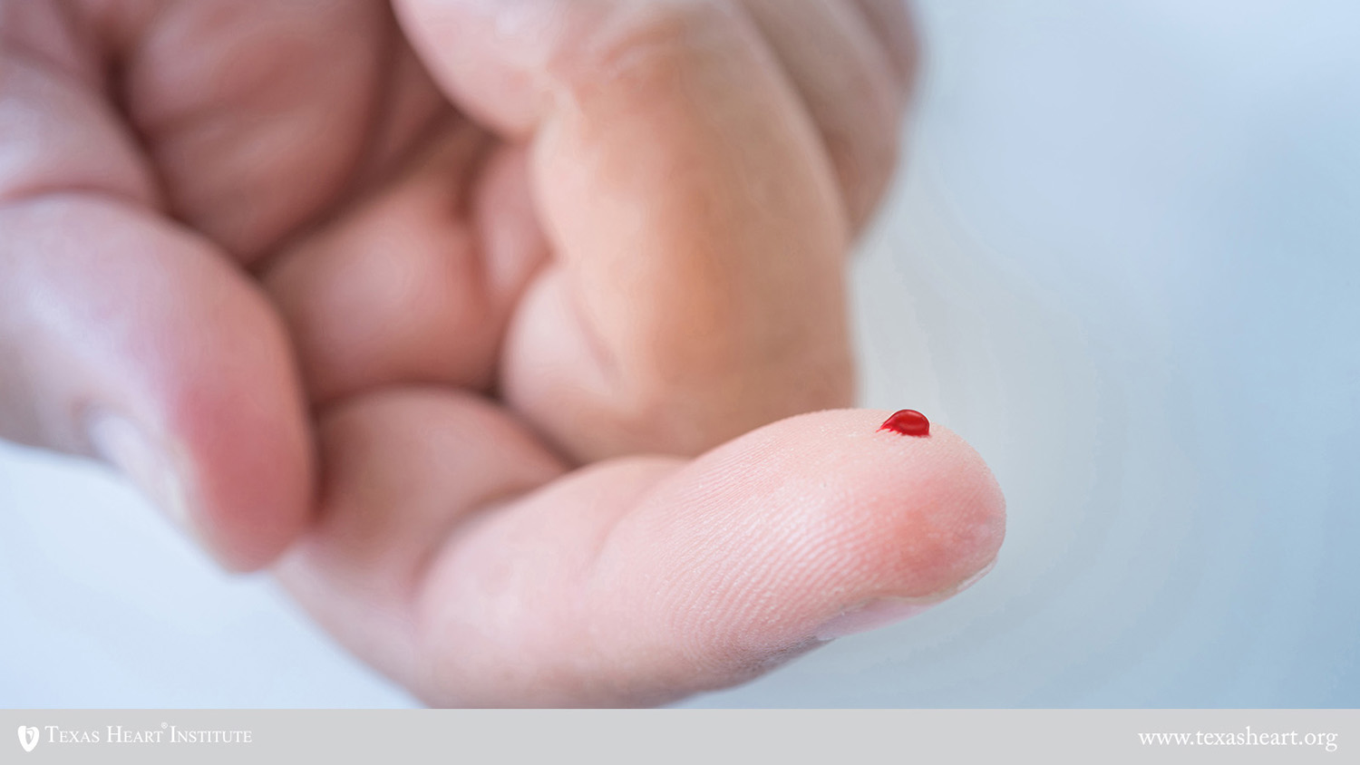 finger with blood drop