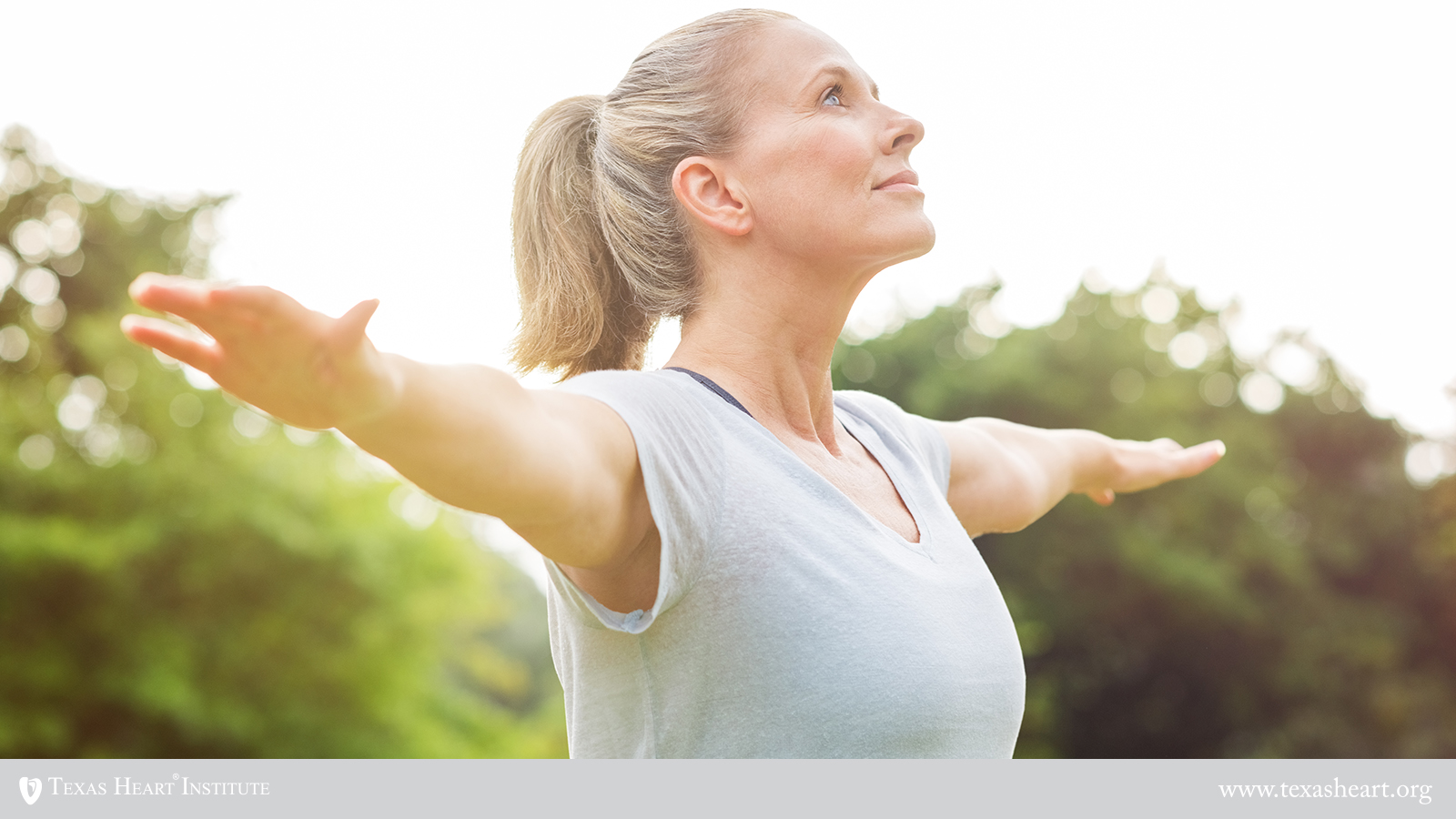 Woman doing yoga exercise, stretching arm